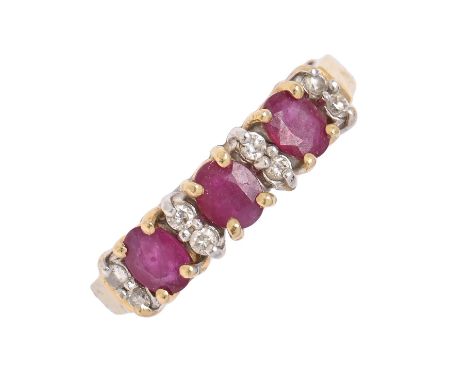 A ruby and diamond ring, in gold marked 750, 3.2g, size O  Good condition