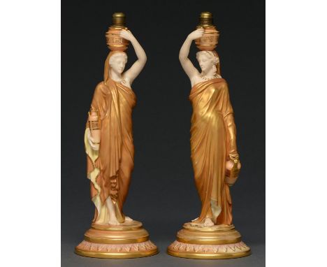 A pair of Royal Worcester figures of Grecian water carriers, 1913,&nbsp;with contemporary brass fitment for a Samuel Clark Cr