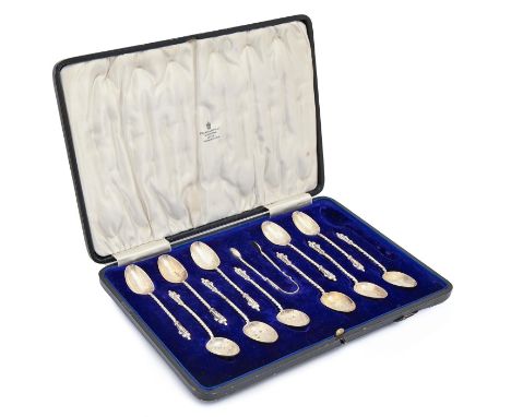 A set of eleven Victorian silver coffee spoons and pair of sugar bows, Apostle pattern with spiral stem, by George Unite &amp