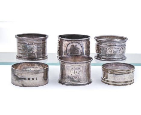 Four silver napkin rings, various makers and dates and a Chinese silver napkin ring, early 20th c, 3ozs 17dwts and a plated n