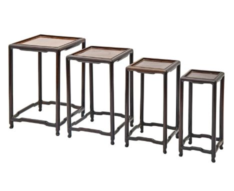 A set of four graduated Chinese hardwood vase stands, circa early 20th c, the largest 29cm h; 20 x 20cm  Second largest table