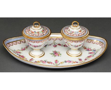 A French porcelain inkstand, 19th c, of oval form with pair of shield shaped bowls, liners and covers, painted with flowers a