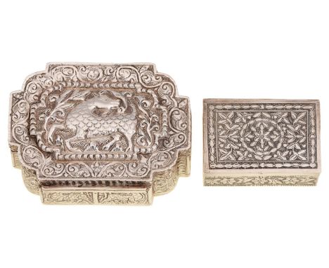 A South East Asian silver repousse box, early 20th c, the lid decorated with a deer, 93mm l and a silver snuff box marked SIL