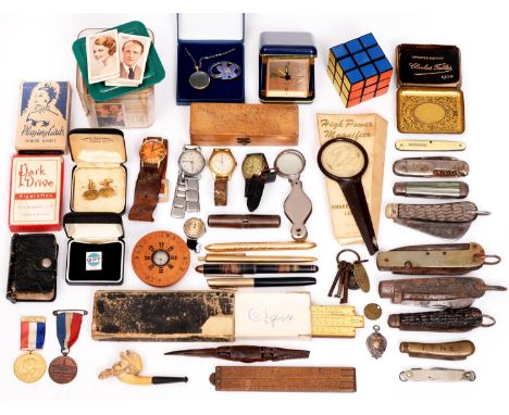 Miscellaneous fountain and other pens, wristwatches, a slide rule, silver watch fob shield, Japanese divination compass, play