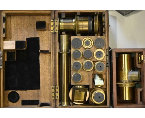 A cased set of lacquered brass telescope lenses, early 20th c,&nbsp;etc., (2)&nbsp; Generally good, though please note not ev