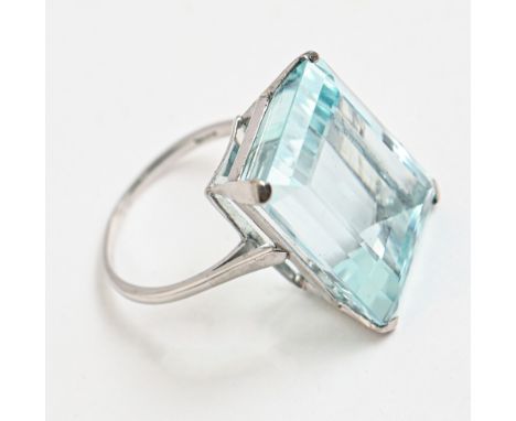 An aquamarine ring, the step cut aquamarine 17 x 22mm, in white gold marked 18ct, 11.2g, size R  Good condition, slight wear 