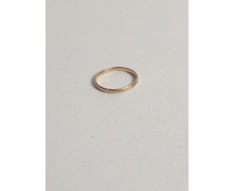 9ct gold wedding band, size K. Shipping Group (A). 