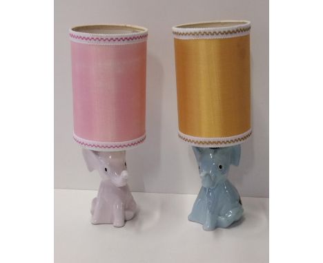Pair of vintage ceramic table lamps in the form of sitting elephants. Collection only. 