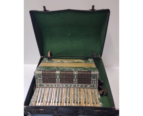 A Stanelli Italian vintage accordian in original hard carry case. Collection only. 