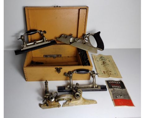 Very rare and complete vintage Stanley One 55E plough plane in original hinged wooden box together with blades and instructio