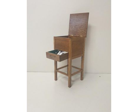 Vintage oak sewing box raised on column legs. Collection only. 
