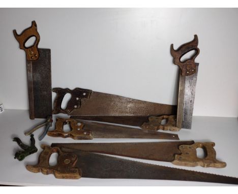 7 vintage hand saws, 6 of which being by Disston (USA) the other being Canadian Medallion, together with 2 saw teeth setters: