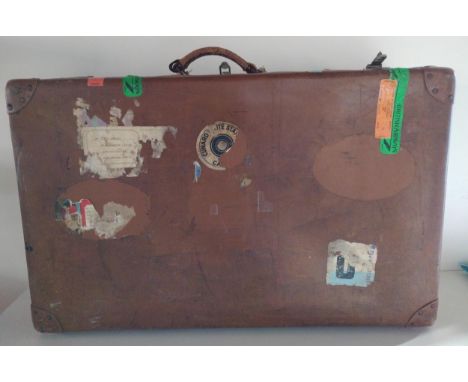 Well-travelled vintage leather suitcase. Collection only. 