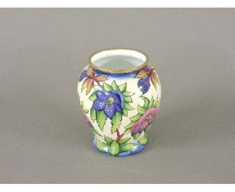 A Moorcroft enamel vase, 8.5cm in a fitted case