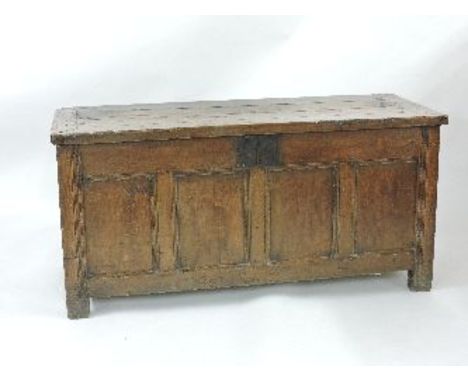 A late 17th century oak four panel coffer