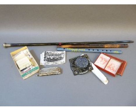 Railway postcards, cigarette cards, harmonica, two flutes, and a silver topped walking stick