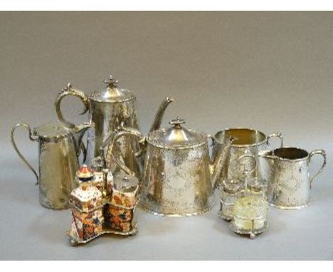 A late Victorian silver plated four piece tea and coffee service, a hot water jug, and two plated condiments