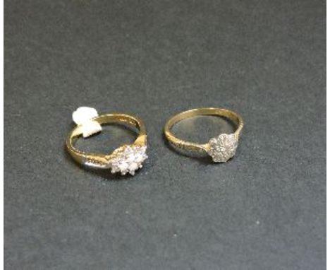 A diamond set daisy cluster ring, marked 9ct, and a 9ct gold opal and diamond lozenge shaped cluster ring