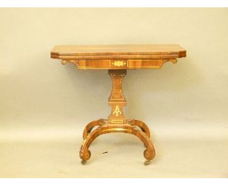 A Regency rosewood fold over card table, with brass inlay, 87cm wide