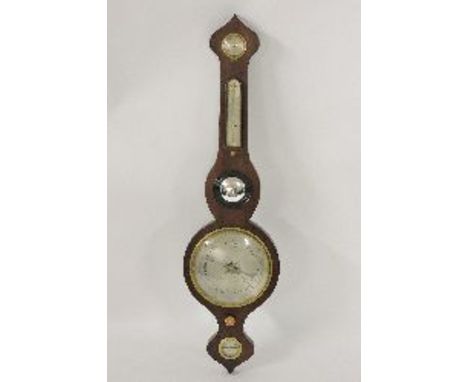 A Victorian mahogany onion top wheel barometer