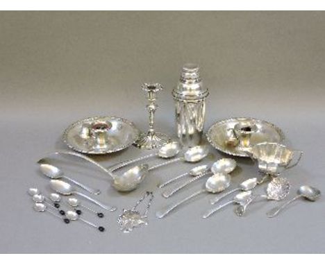 A quantity of silver plate and silver, including a silver candlestick, coffee bean teaspoons, and a 19th century mahogany emb