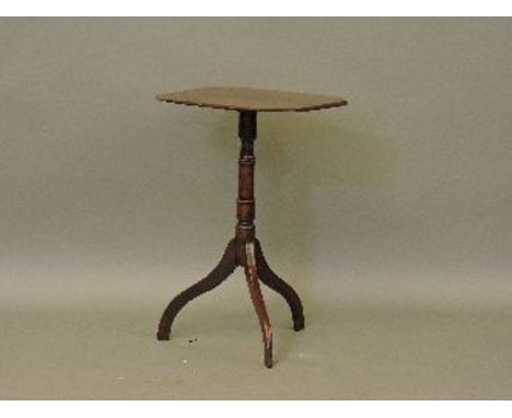 A George III mahogany wine table, the rectangular top on a tripod base, 62cm high