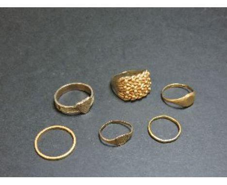 Two 22ct gold wedding rings, a 9ct gold shot ring, two 9ct gold signet rings, and a gold hair ring