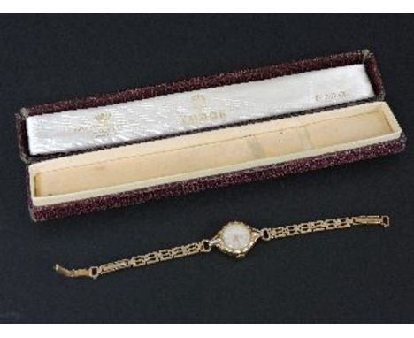 A ladies 9ct gold Tudor Royal mechanical watch, with ring end lug fittings, model no 310691, on a later 9ct gold bracelet, ca