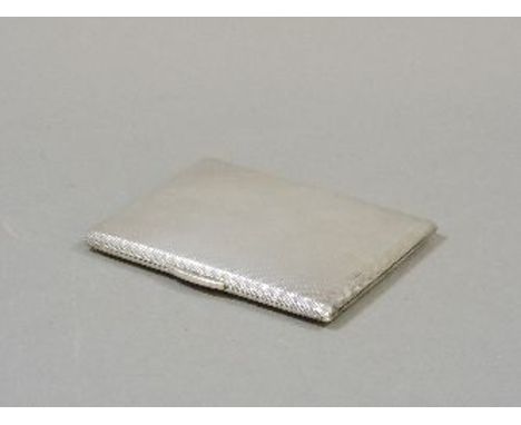 A silver engine turned cigarette case, by Garrard, London, 1953