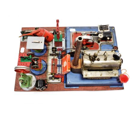 Wilesco Stationary Steam Engine with single horizontal cylinder on tin base, together with assorted accessories, all mounted 