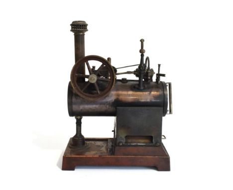 Early German Stationary Steam Engine with single fixed cylinder, and flywheel to top of boiler, with governor, on cast base p