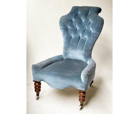SLIPPER CHAIR, Victorian, walnut, with sapphire blue buttoned velvet, on white ceramic castors, 60cm W. 