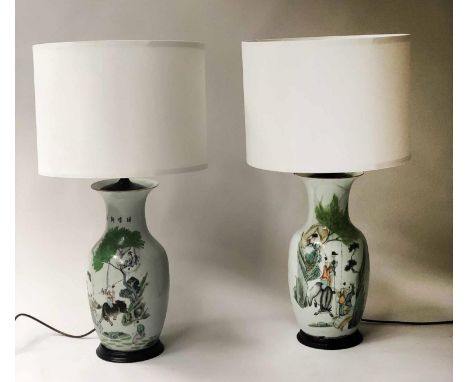LAMPS, a pair, early 20th century Chinese vase form ceramic green and white with script and figures on stands, 78cm H. (2) 