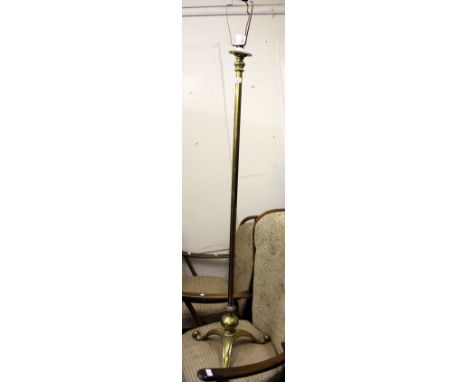 A BRASS STANDARD LAMP with column support and scrolling tripod base, 146cm tall