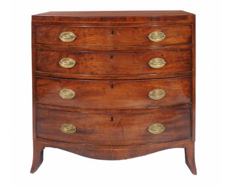 A GEORGE III BOW FRONTED MAHOGANY CHEST of four long drawers with satinwood cross banding to the top, all standing on outswep