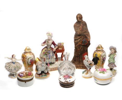 A SMALL QUANTITY OF CONTINENTAL PORCELAIN ORNAMENTS to include a Meissen style figurine of a lady seated resting against a ta