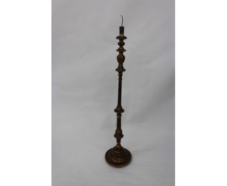 A PAINTED AND PARCEL GILT LAMP STANDARD with turned support and spreading circular base, 158cm high