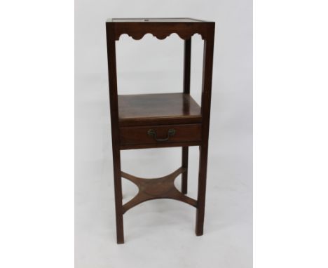 A MAHOGANY TWO TIER OCCASIONAL TABLE the undertier with single drawer and with square legs united by an 'X' stretcher 33cm wi