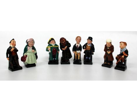 A GROUP OF EIGHT ROYAL DOULTON DICKENS FIGURINES consisting of ; Bill Sikes, Oliver Twist, fagin, Bumble, Tiny Tim, Scrooge, 