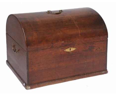 AN ANTIQUE OAK DOME TOPPED TRUNK with brass carrying handles 62cm wide x 51cm high
