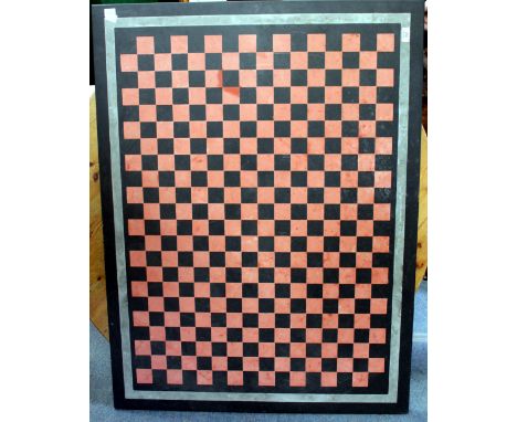 A HEAVY RECTANGULAR SLATE TABLE TOP with inlaid checkerboard decoration, 122cm x 91cm