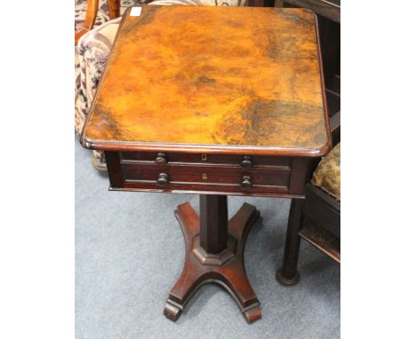 A WALNUT AND ROSEWOOD RECTANGULAR SEWING TABLE with straw to one end on an octagonal column support and platform base with sh