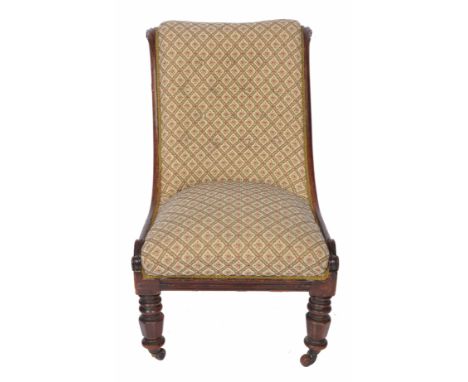 A VICTORIAN MAHOGANY BUTTON BACK UPHOLSTERED OCCASIONAL CHAIR with scrolling acanthus leaf support to the back and turned fac