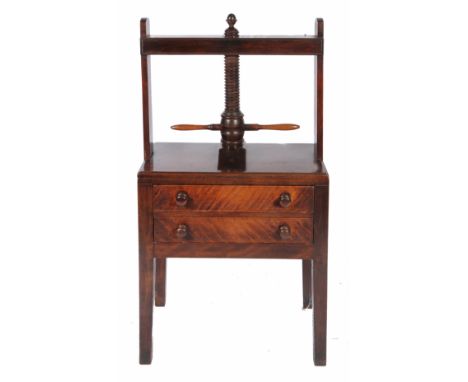 AN EARLY 19TH CENTURY MAHOGANY LINEN PRESS TABLE, the screw down press with turned handles over two drawers with turned knob 