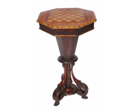 A VICTORIAN OCTAGONAL GAMES TABLE, with intricately inlaid top lifting to reveal fitted interior and wall box within and stan