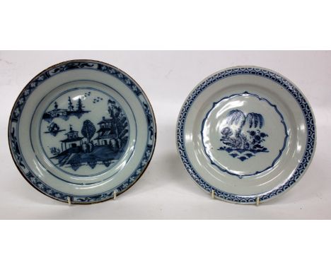 AN ENGLISH 18TH CENTURY DELFTWARE PLATE centrally decorated with a willow tree 23cm diameter together with a further blue and