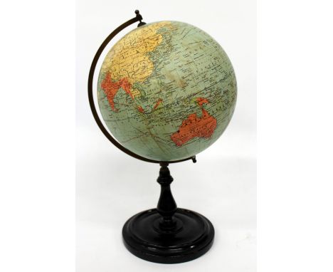 A SMALL DESKTOP PHILLIPS BRITISH EMPIRE GLOBE standing on turned ebonised wooden socle, 37cm tall overall together with a chi