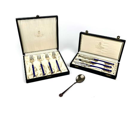 A cased set of four Norwegian silver gilt and enamel dessert forks by David Andersen. Together with a cased set of three silv