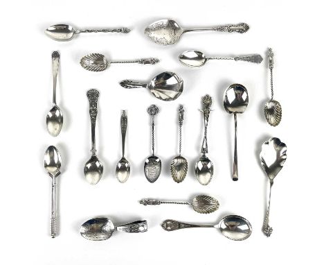 A collection of silver spoons. Including a set of four Victorian apostle teaspoons, two golfing teaspoons, a caddy spoon etc,