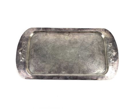 A Liberty &amp; Co Edwardian Art Nouveau silver serving tray. Embossed at both ends with stylised flowers, London 1906, stamp